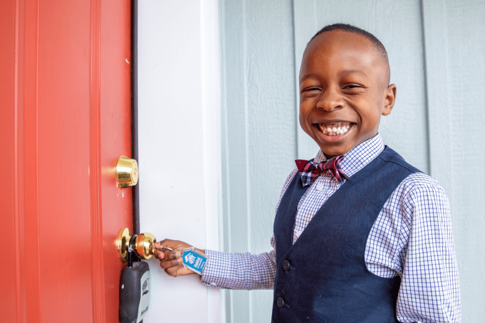 Boy with key in hand