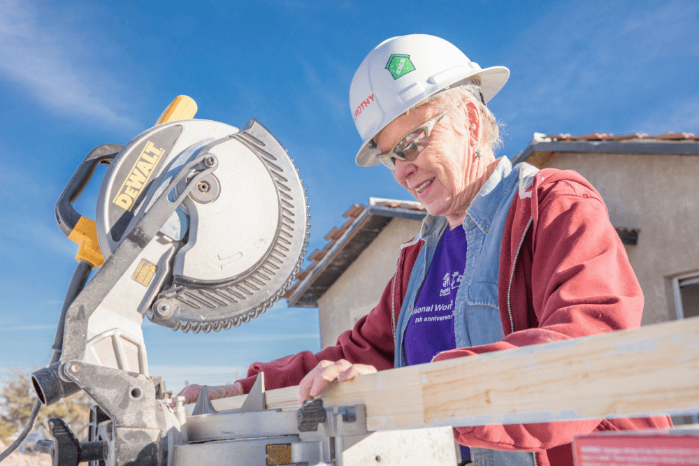 Older woman with chain saw